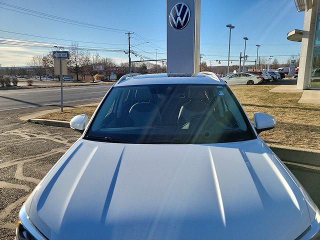 used 2024 Volkswagen Taos car, priced at $24,000