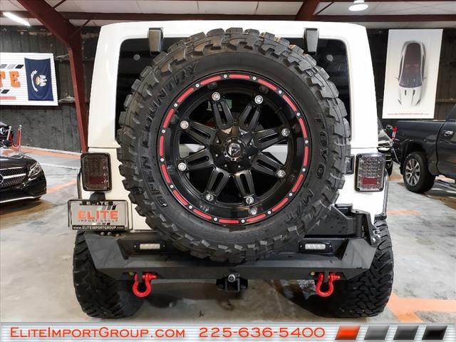 used 2015 Jeep Wrangler Unlimited car, priced at $27,884