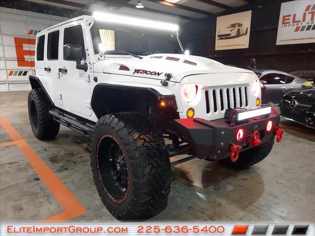 used 2015 Jeep Wrangler Unlimited car, priced at $27,884