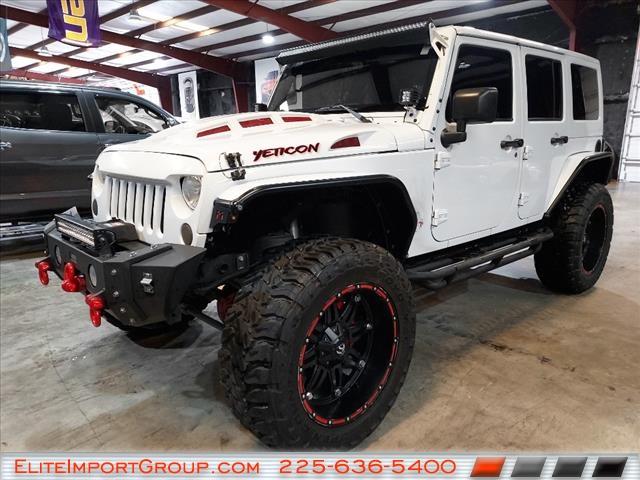 used 2015 Jeep Wrangler Unlimited car, priced at $27,884