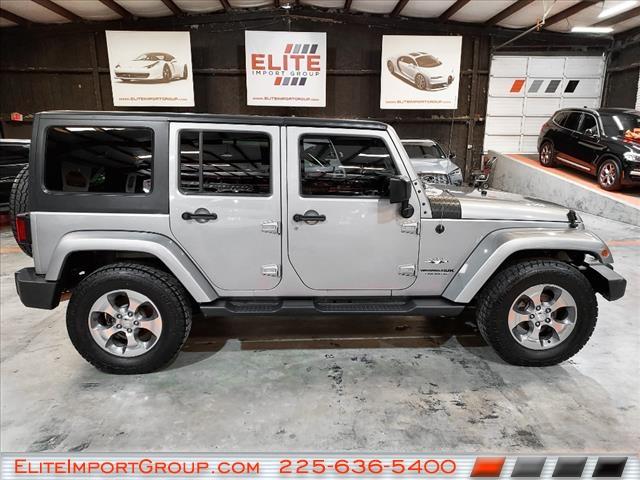 used 2018 Jeep Wrangler JK Unlimited car, priced at $23,884