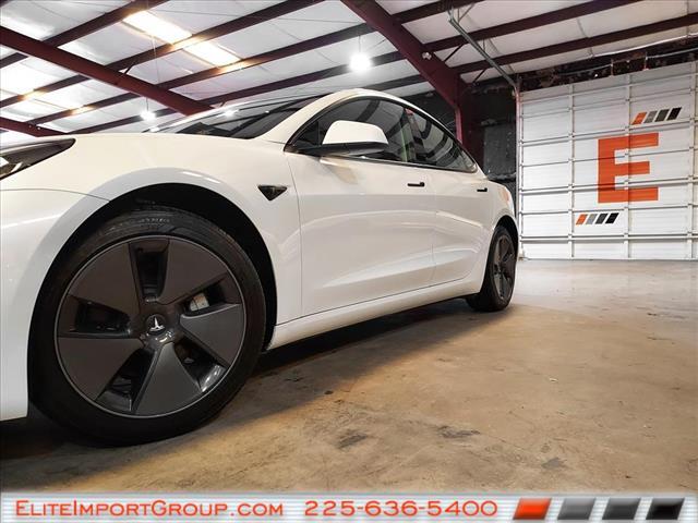 used 2023 Tesla Model 3 car, priced at $28,772