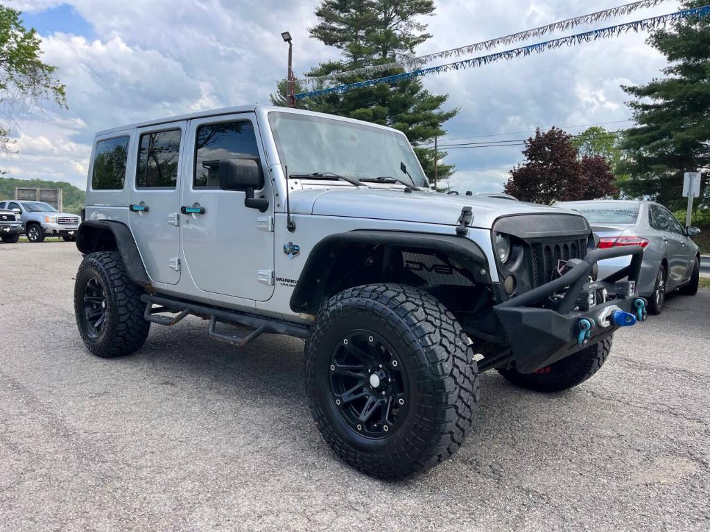 used 2012 Jeep Wrangler Unlimited car, priced at $15,995