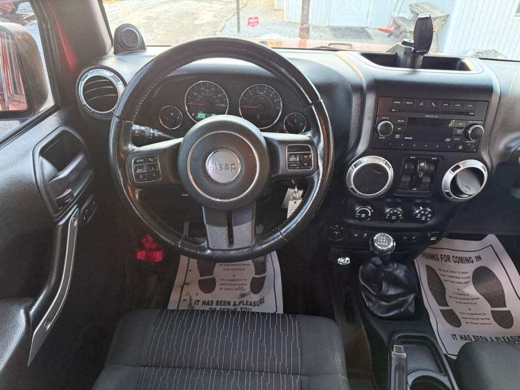 used 2011 Jeep Wrangler Unlimited car, priced at $15,995