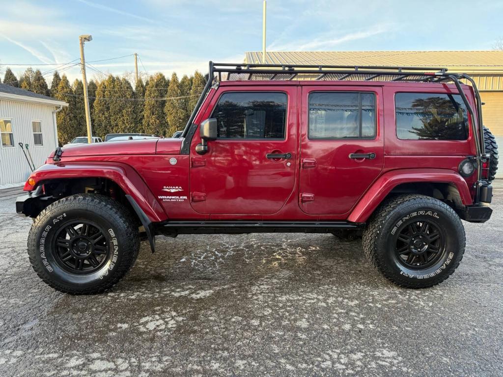 used 2011 Jeep Wrangler Unlimited car, priced at $15,995