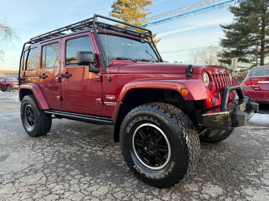 used 2011 Jeep Wrangler Unlimited car, priced at $15,995