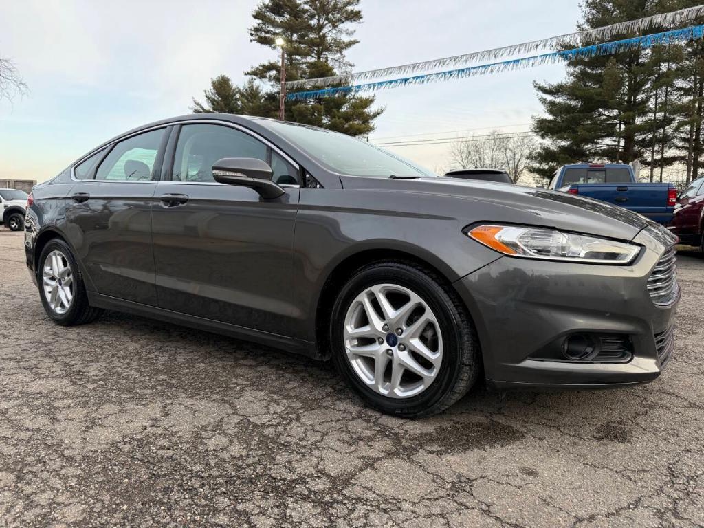 used 2016 Ford Fusion car, priced at $7,995