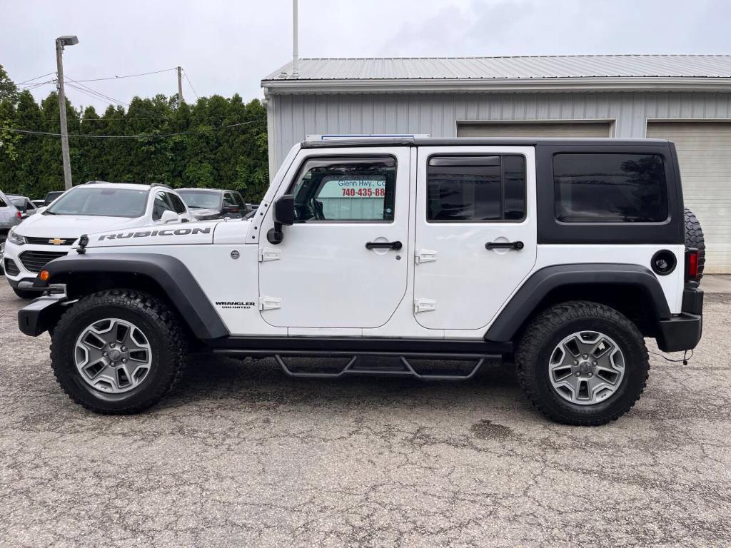 used 2013 Jeep Wrangler Unlimited car, priced at $14,995