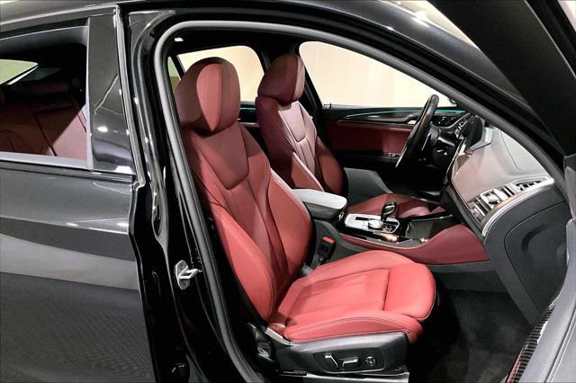 used 2024 BMW X4 car, priced at $62,987