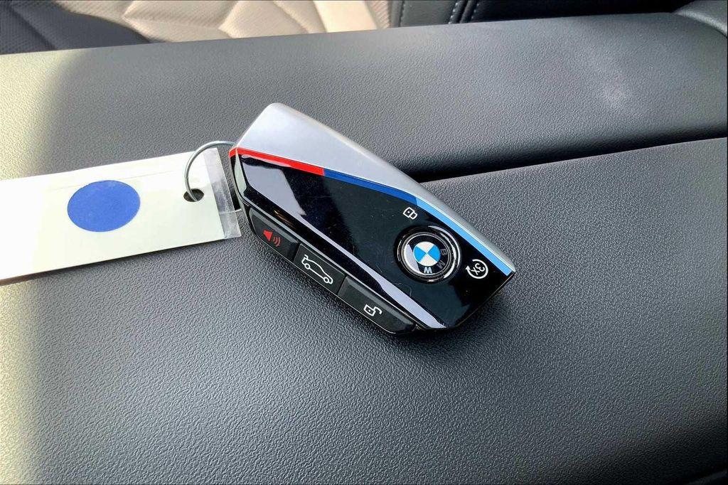 used 2025 BMW i5 car, priced at $68,987