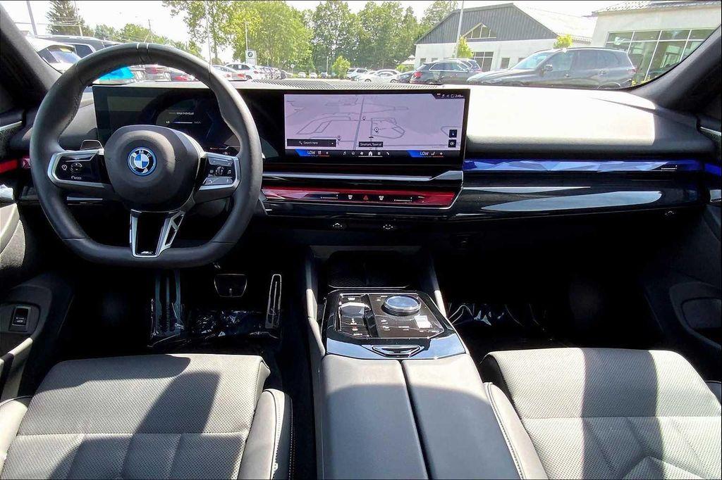 used 2025 BMW i5 car, priced at $68,987