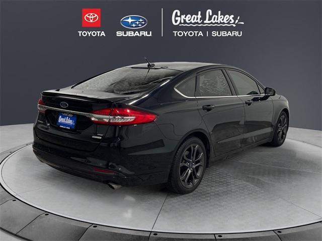 used 2018 Ford Fusion car, priced at $12,020