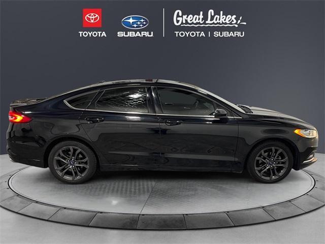 used 2018 Ford Fusion car, priced at $12,020