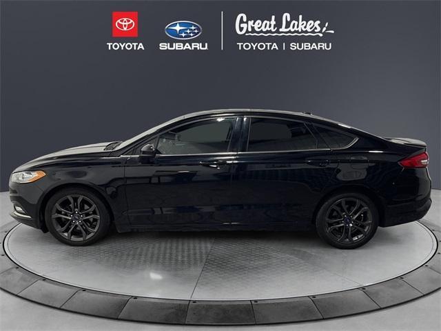 used 2018 Ford Fusion car, priced at $12,020