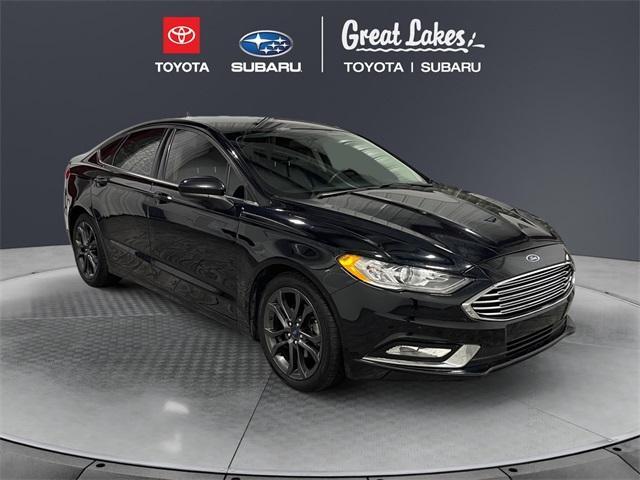 used 2018 Ford Fusion car, priced at $12,020