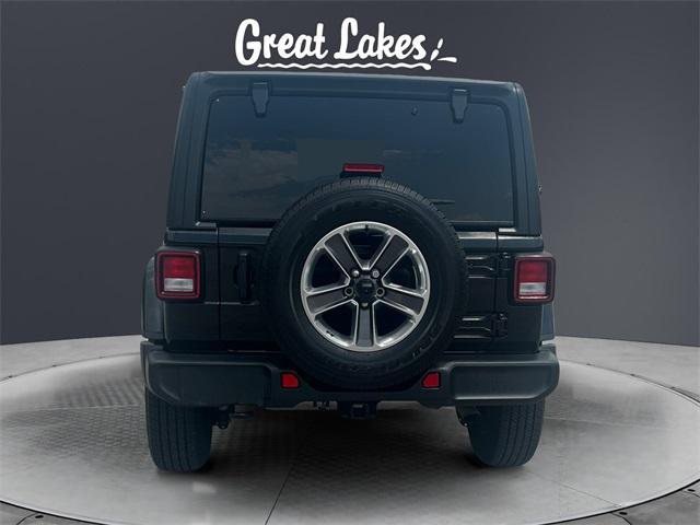 used 2021 Jeep Wrangler Unlimited car, priced at $32,240
