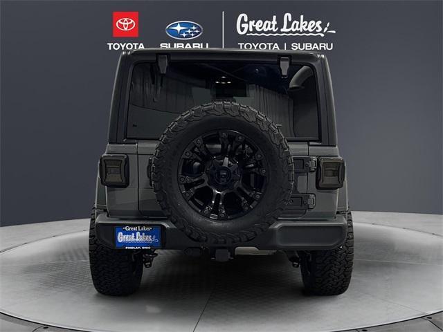 used 2021 Jeep Wrangler Unlimited car, priced at $30,022