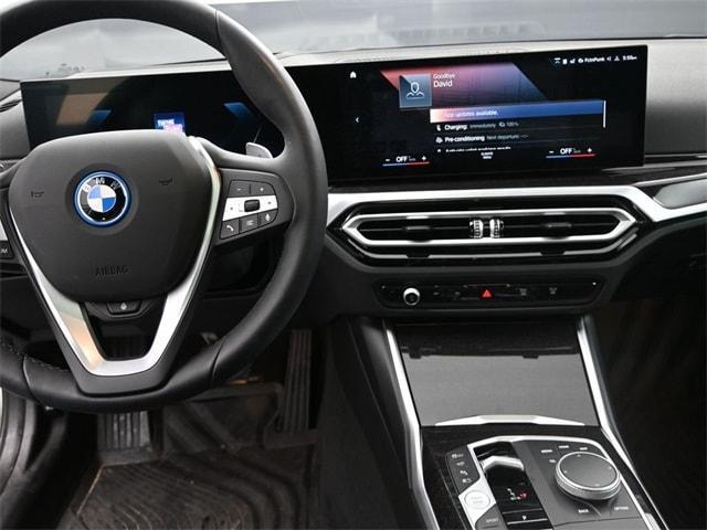 used 2024 BMW 330e car, priced at $38,054