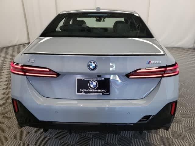 used 2024 BMW i5 car, priced at $70,107