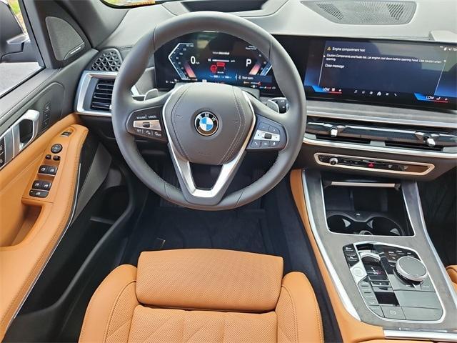 used 2024 BMW X5 car, priced at $67,500