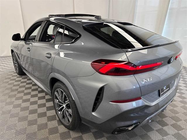 new 2025 BMW X6 car, priced at $84,325