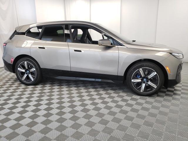 new 2024 BMW iX car, priced at $97,595