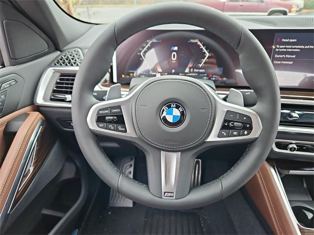 new 2025 BMW X6 car, priced at $77,875