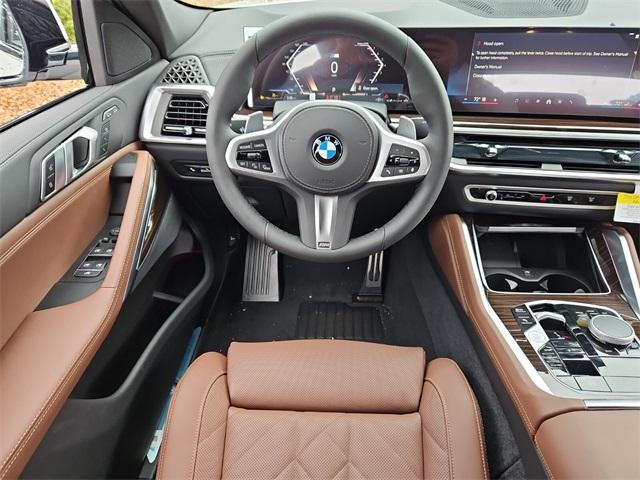 new 2025 BMW X6 car, priced at $77,875