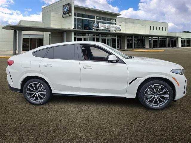 new 2025 BMW X6 car, priced at $77,875