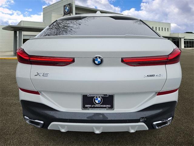 new 2025 BMW X6 car, priced at $77,875