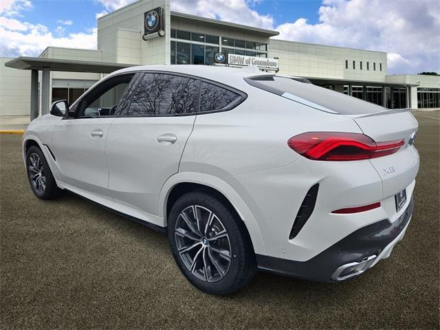 new 2025 BMW X6 car, priced at $77,875