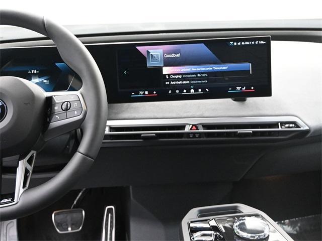 new 2026 BMW iX car, priced at $104,070
