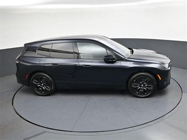 new 2026 BMW iX car, priced at $104,070