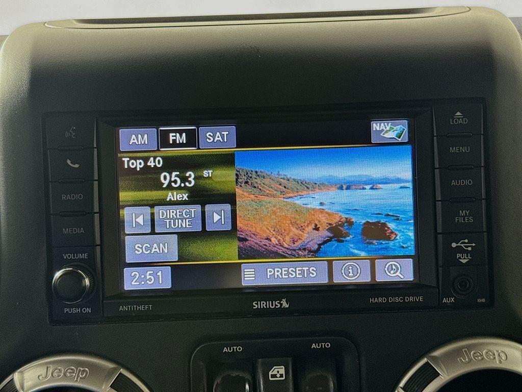 used 2016 Jeep Wrangler Unlimited car, priced at $15,307