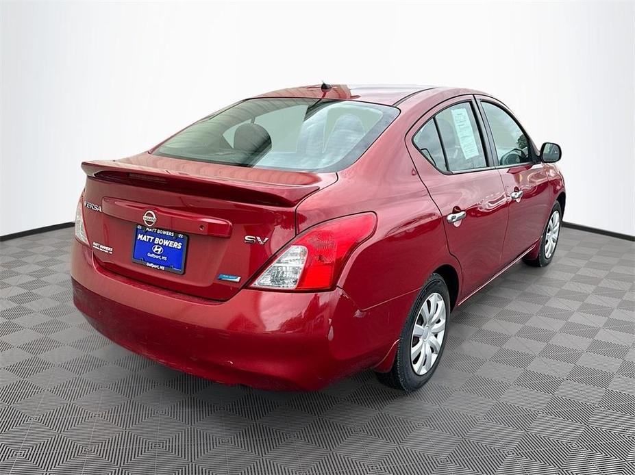 used 2013 Nissan Versa car, priced at $8,999