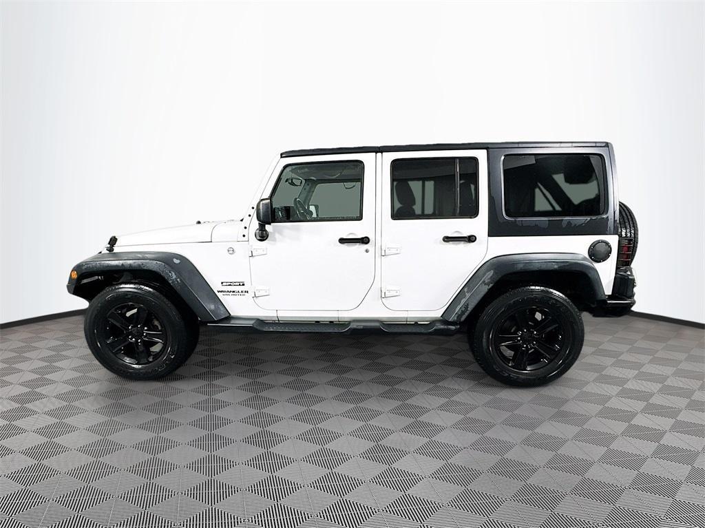 used 2015 Jeep Wrangler Unlimited car, priced at $12,980