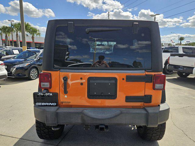 used 2012 Jeep Wrangler Unlimited car, priced at $12,998