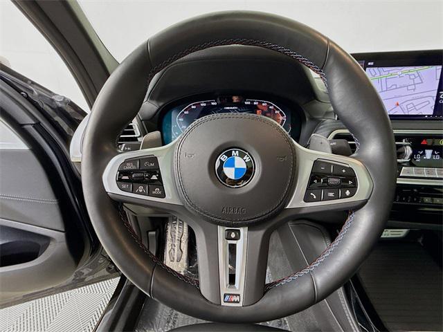 used 2023 BMW X4 car, priced at $56,982