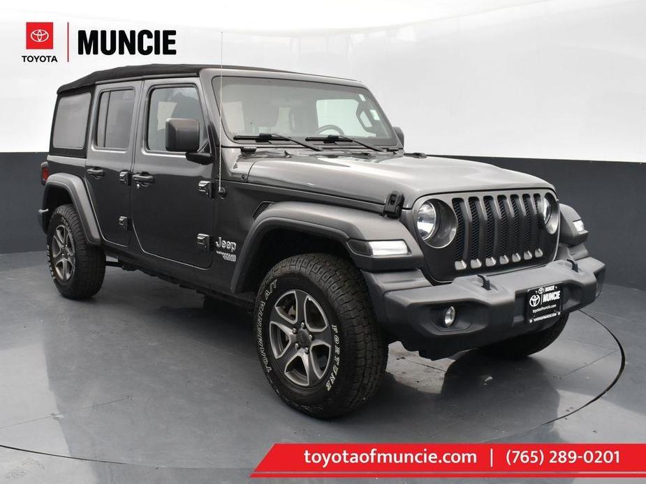 used 2021 Jeep Wrangler Unlimited car, priced at $27,330