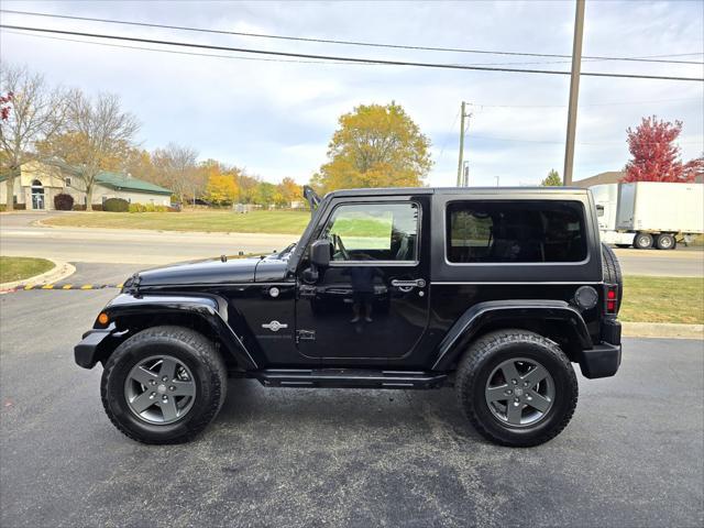 used 2015 Jeep Wrangler car, priced at $17,425