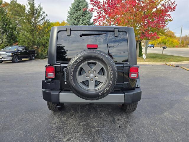 used 2015 Jeep Wrangler car, priced at $17,425