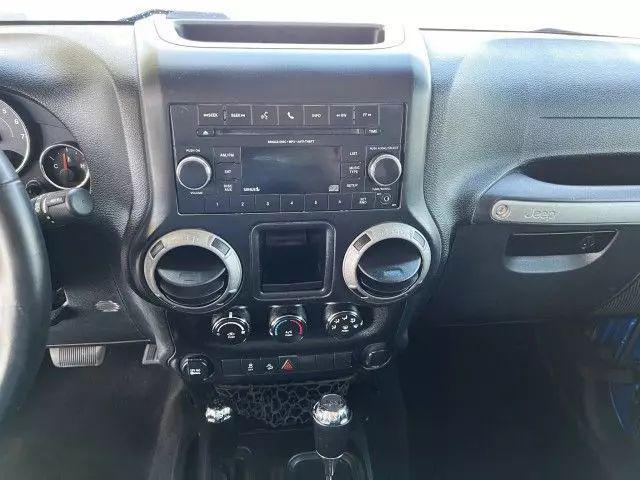 used 2015 Jeep Wrangler Unlimited car, priced at $10,995