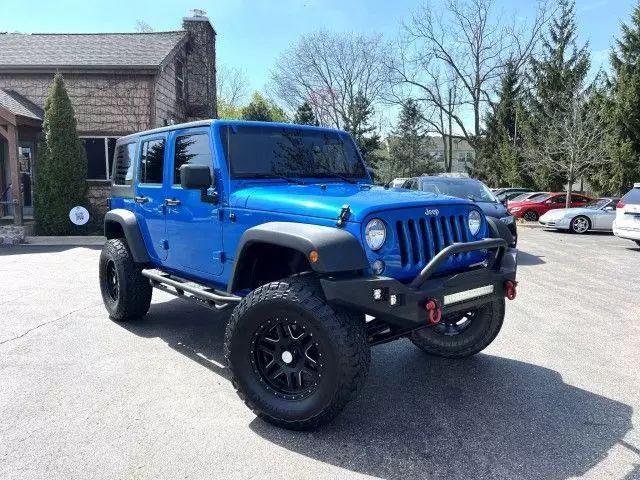 used 2015 Jeep Wrangler Unlimited car, priced at $10,995
