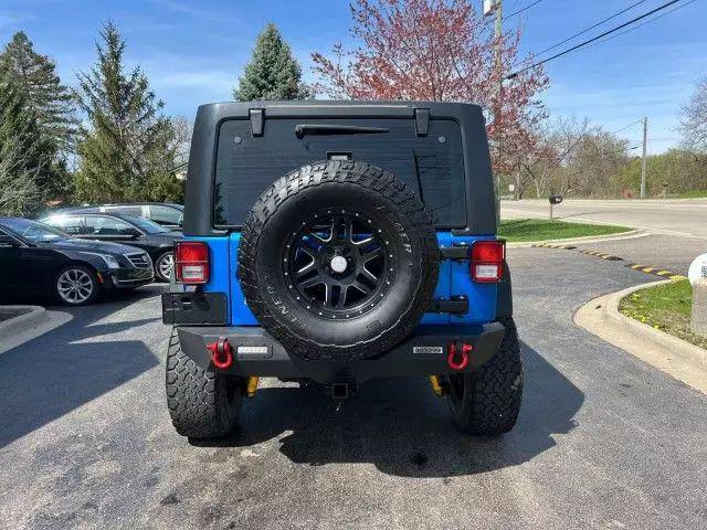 used 2015 Jeep Wrangler Unlimited car, priced at $10,995