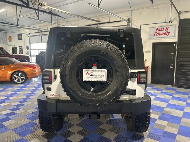 used 2013 Jeep Wrangler Unlimited car, priced at $17,999