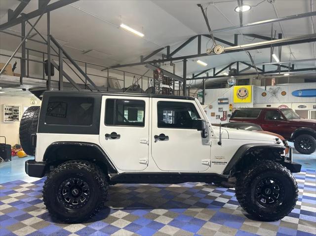 used 2013 Jeep Wrangler Unlimited car, priced at $17,999