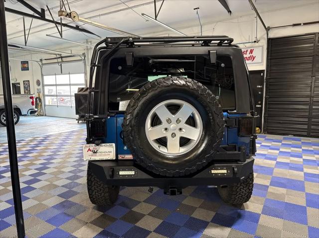 used 2010 Jeep Wrangler Unlimited car, priced at $14,988
