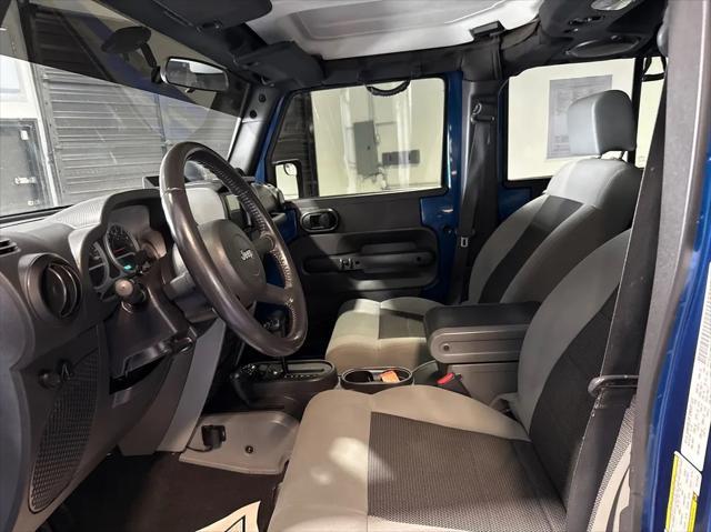 used 2010 Jeep Wrangler Unlimited car, priced at $14,988