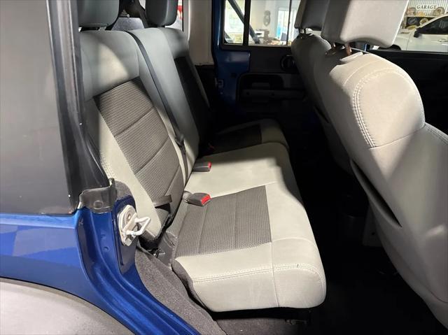 used 2010 Jeep Wrangler Unlimited car, priced at $14,988