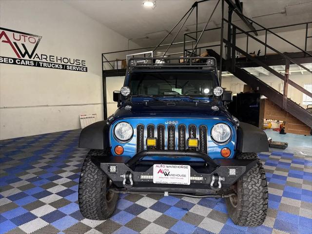 used 2010 Jeep Wrangler Unlimited car, priced at $14,988